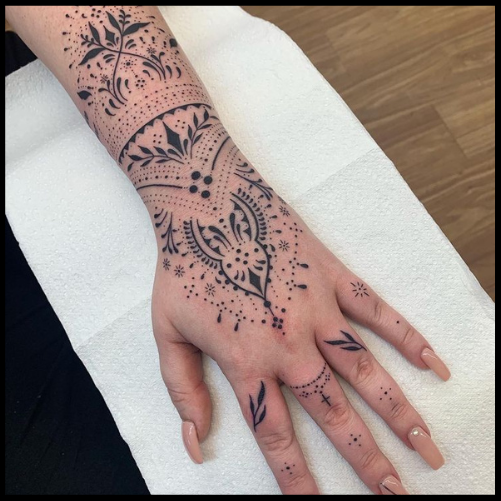 Dots and Flowers Hand Tattoo