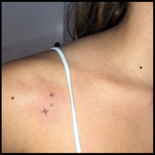 Sparkles Arm Tattoo