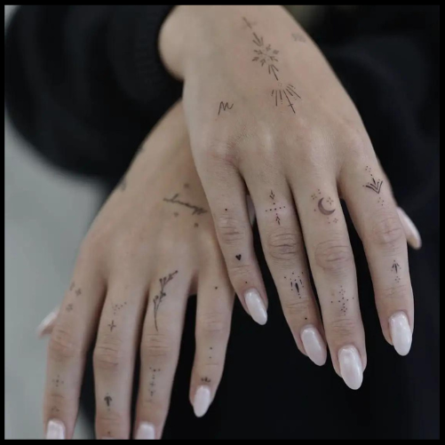 Thin-Lined Hand Tattoo