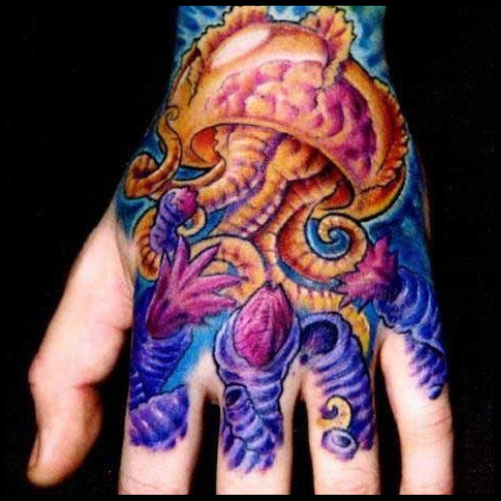 Vivid Hand Tattoo