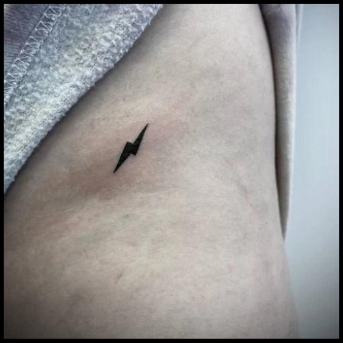 Bikini Line Lightning Bolt Tattoo
