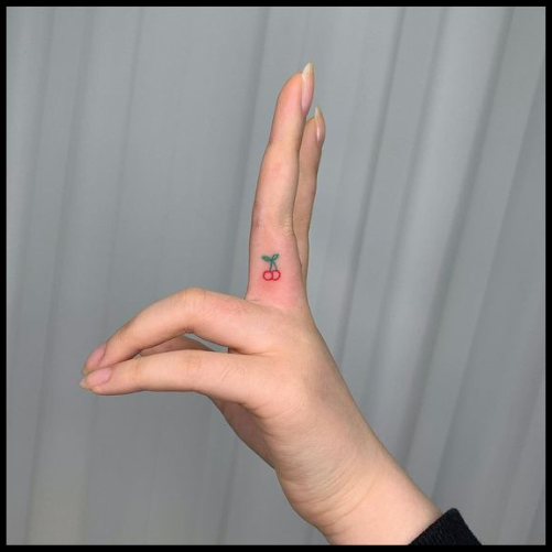 Cherry Finger Tattoo