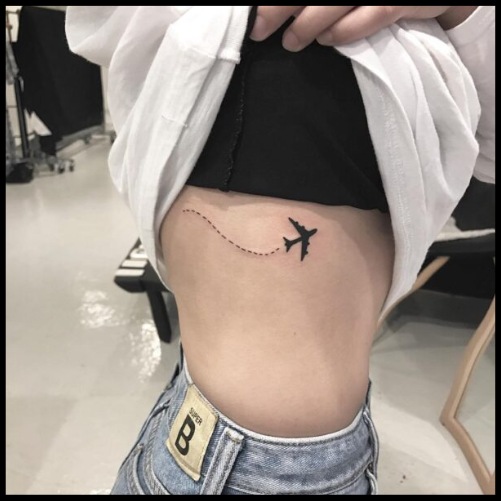 Discreet Plane Tattoo on the Rib