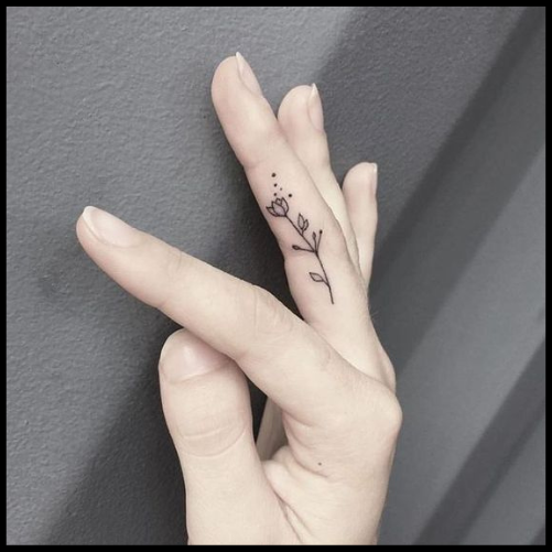 Flower Finger Tattoo