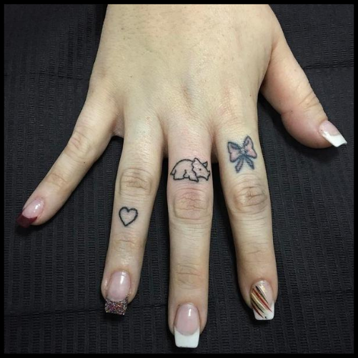 Hand-Poked Dinosaur Tattoo