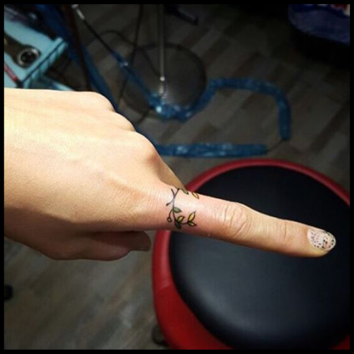Laurel Wreath Finger Tattoo