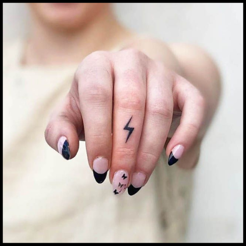 Lightning Bolt Finger Tattoo