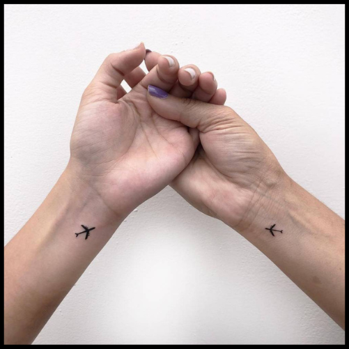 Matching Cosmos Airplane Tattoos