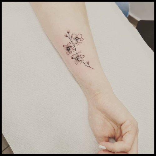 Minimalist Orchid Tattoo