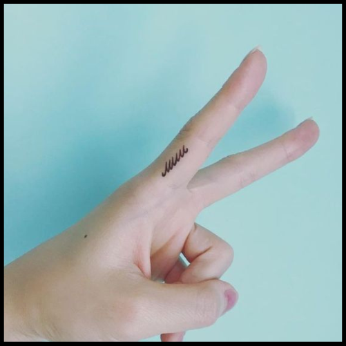 Scribble Finger Tattoo