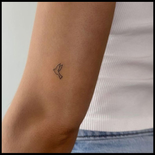 Tiny ‘Be’ Tattoo