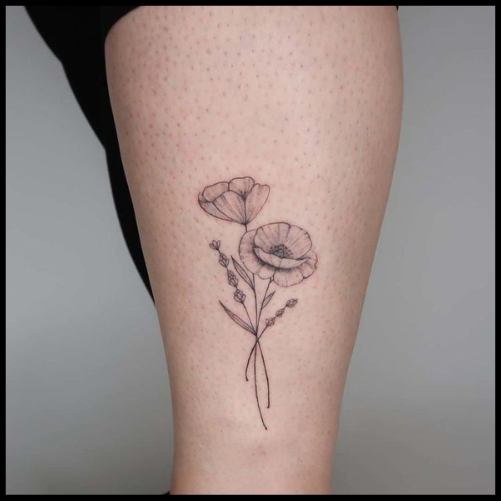 Discreet Black And White Poppy Tattoo