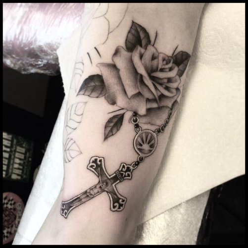 Floral Accents in Rosary Tattoos