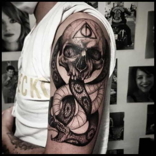 Half-Sleeve Tattoo Featuring Multiple Death Eater Masks