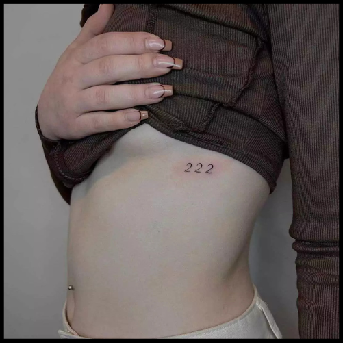Natural 222 Tattoo On Rib