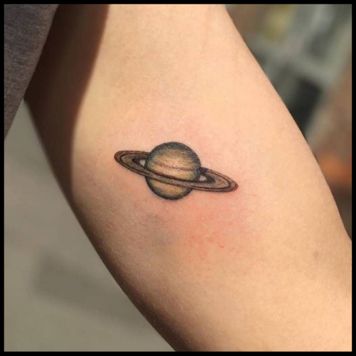 Saturn Bicep Tattoo