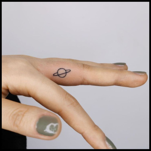 Saturn Finger Tattoo