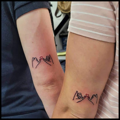 Unique Couple Tattoo With Beautiful Outlines